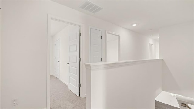 613 Lobelia Way, Locust Grove, GA 30248 - hallway with carpet flooring, baseboards, and recessed lighting