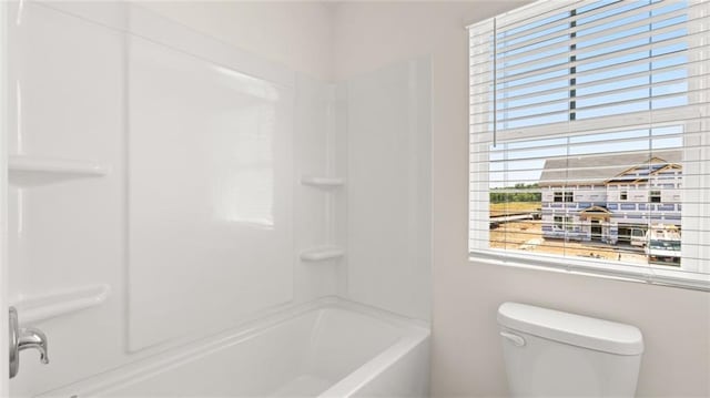 613 Lobelia Way, Locust Grove, GA 30248 - bathroom with toilet and shower / washtub combination