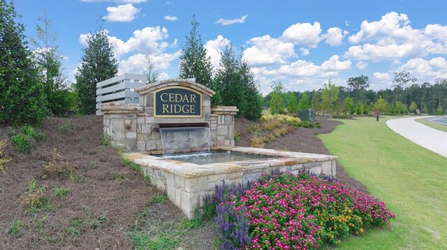 613 Lobelia Way, Locust Grove, GA 30248 - community sign featuring a lawn