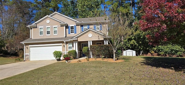 view of front of property featuring a front yard, a garage, and a shed