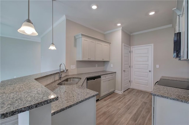 kitchen featuring decorative light fixtures, white cabinetry, sink, stainless steel dishwasher, and kitchen peninsula