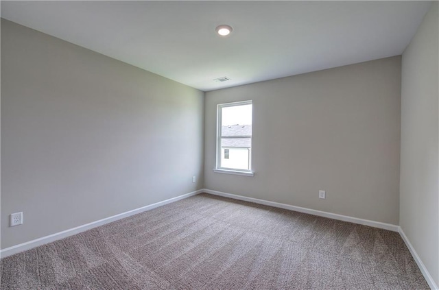 view of carpeted spare room