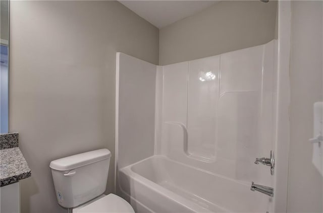 full bathroom with shower / tub combination, vanity, and toilet