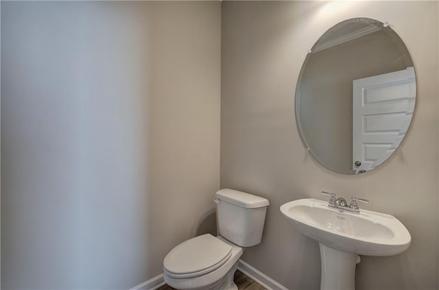 bathroom featuring toilet