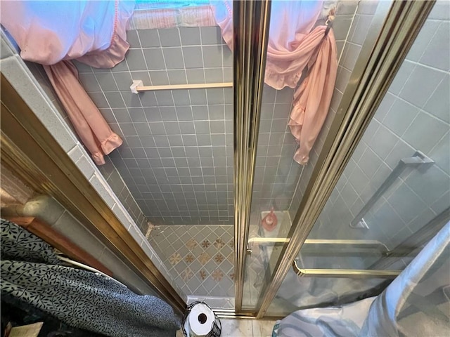 bathroom with a stall shower