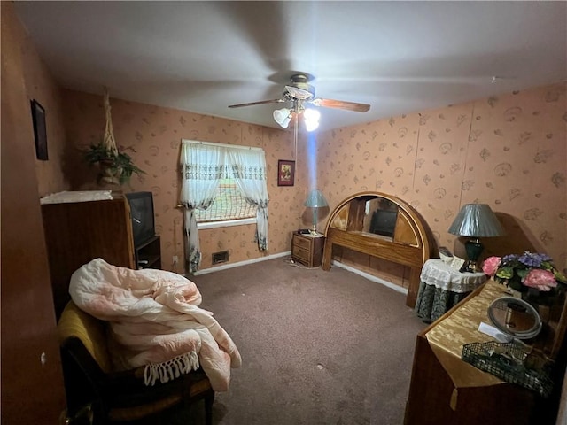 bedroom with baseboards, wallpapered walls, ceiling fan, and carpet floors