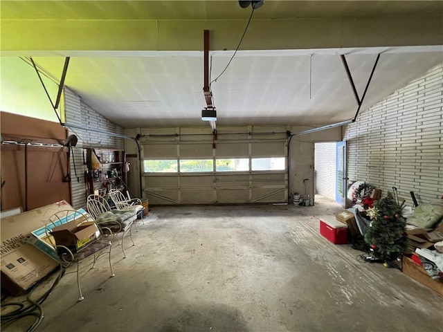 garage featuring a garage door opener