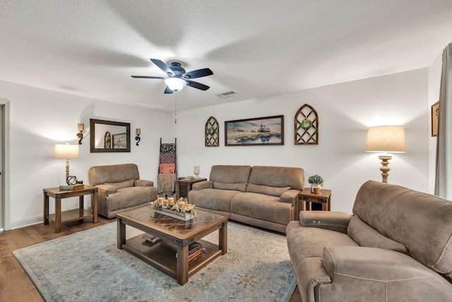 1464 Fieldstone Ct, Winder, GA 30680 - living area featuring a ceiling fan and wood finished floors