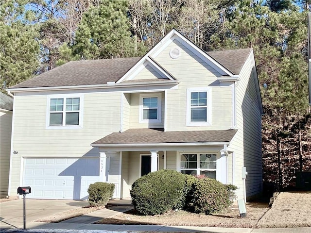 view of front of property with a garage