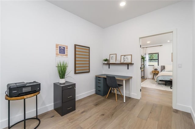 office with recessed lighting, baseboards, and light wood finished floors