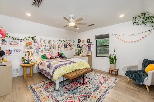 bedroom featuring visible vents, recessed lighting, ceiling fan, and wood finished floors