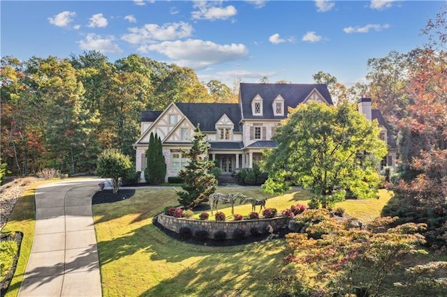 view of front of property with a front lawn