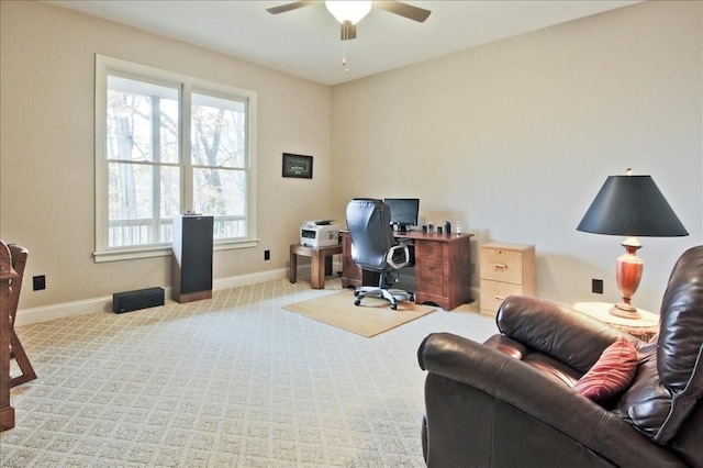 office area featuring ceiling fan and light colored carpet