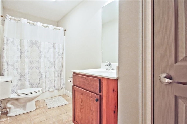 full bathroom featuring vanity, toilet, tile patterned flooring, and shower / bath combo with shower curtain