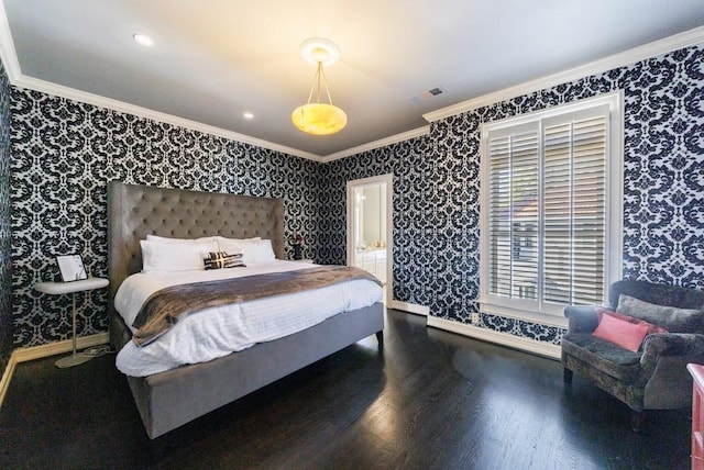 bedroom with wood finished floors, visible vents, baseboards, wallpapered walls, and crown molding