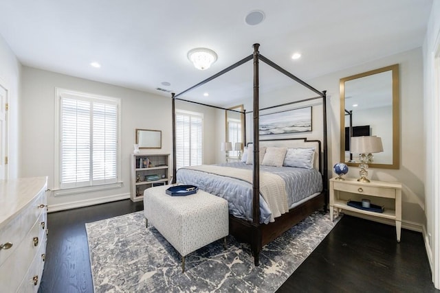 bedroom with dark wood-style floors, recessed lighting, and visible vents