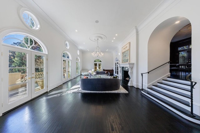 dining space with french doors, wood finished floors, a wealth of natural light, and baseboards