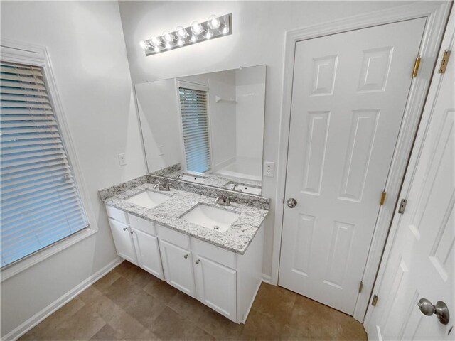 2231 Mill Garden Pl, Buford, GA 30519 - unfurnished bedroom featuring multiple closets, carpet, and ceiling fan