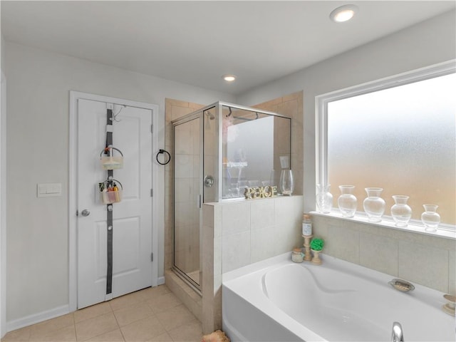 bathroom with plus walk in shower and tile patterned floors