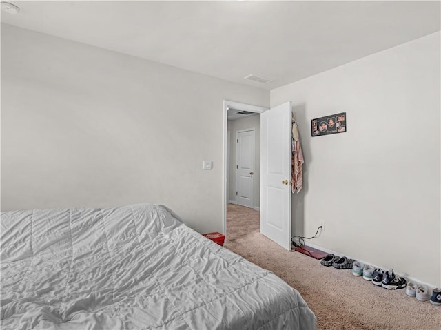 bedroom featuring carpet floors