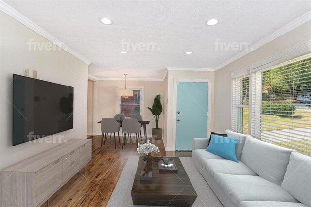 living area featuring crown molding, baseboards, recessed lighting, and wood finished floors