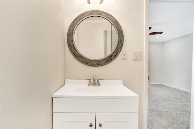 bathroom with vanity and baseboards