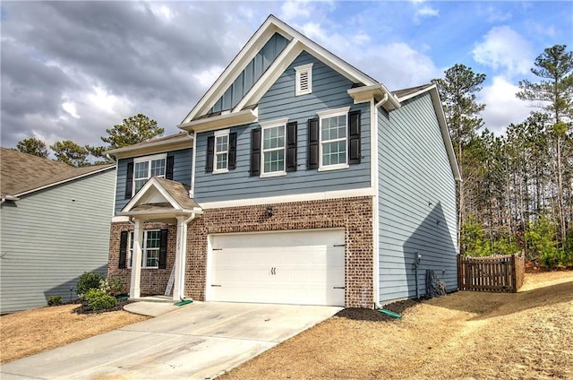 craftsman inspired home featuring brick siding, board and batten siding, fence, a garage, and driveway