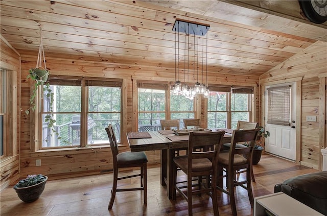 128 Rushing Waters Ct, Talking Rock, GA 30175 - dining room featuring vaulted ceiling, wooden ceiling, wood walls, and hardwood / wood-style flooring