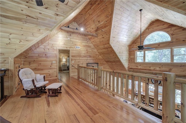 128 Rushing Waters Ct, Talking Rock, GA 30175 - living area featuring wood ceiling, wooden walls, hardwood / wood-style flooring, ceiling fan, and high vaulted ceiling