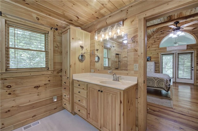 128 Rushing Waters Ct, Talking Rock, GA 30175 - bathroom with wooden walls, healthy amount of natural light, vanity, wooden ceiling, and ceiling fan