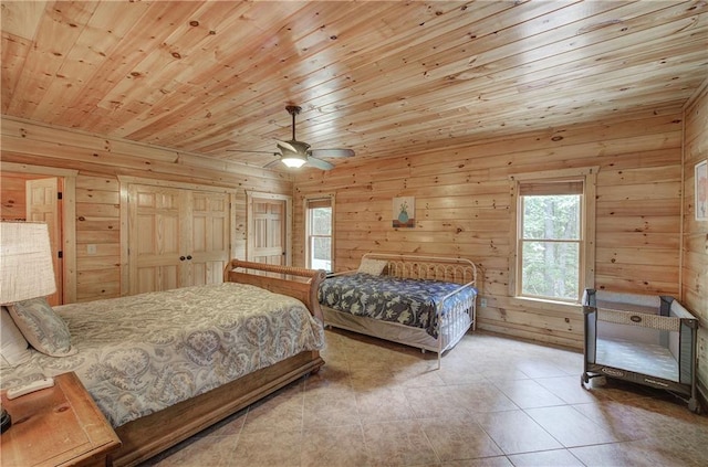 128 Rushing Waters Ct, Talking Rock, GA 30175 - tiled bedroom with wooden ceiling, wooden walls, and a ceiling fan