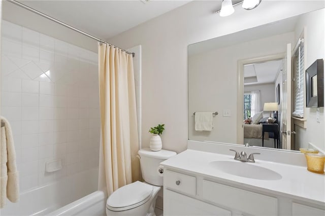 bathroom featuring toilet, vanity, and shower / bath combination with curtain
