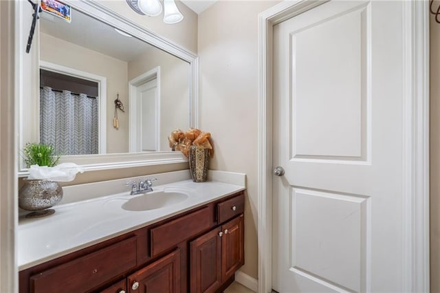 full bath featuring vanity