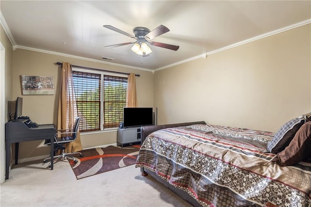carpeted bedroom with a ceiling fan, crown molding, baseboards, and visible vents