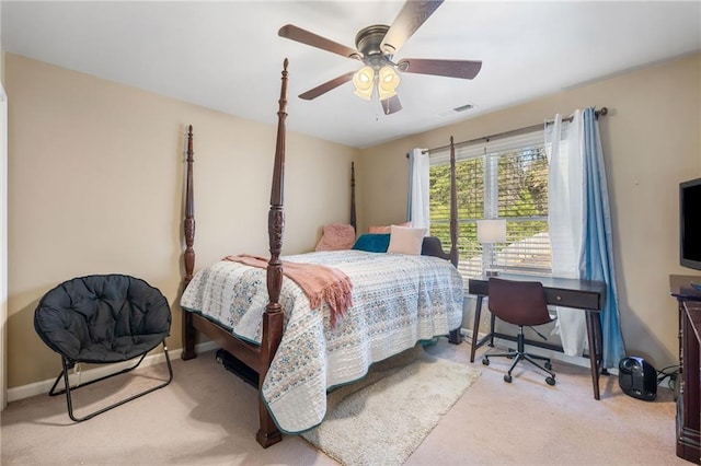 bedroom with carpet floors, baseboards, visible vents, and ceiling fan