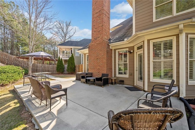 view of patio with fence