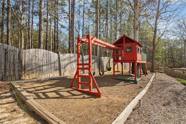 view of jungle gym featuring a fenced backyard