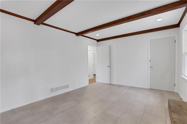 empty room featuring beam ceiling, light tile patterned floors, recessed lighting, visible vents, and baseboards