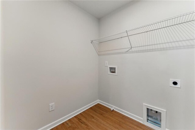 20 Running Ter NW, Cartersville, GA 30121 - washroom featuring wood finished floors, electric dryer hookup, laundry area, baseboards, and hookup for a washing machine