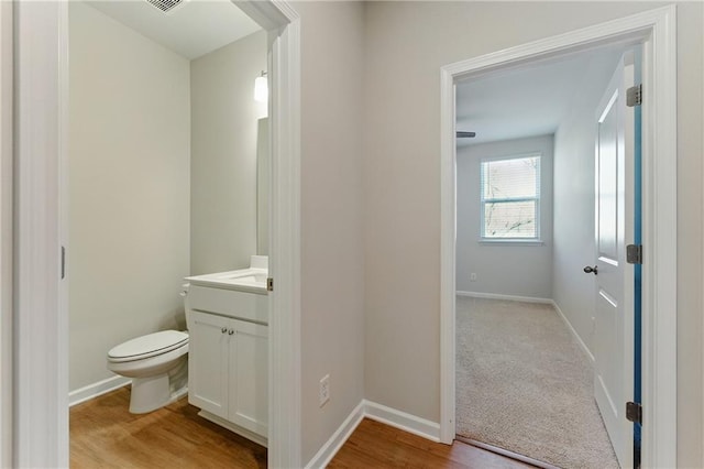 20 Running Ter NW, Cartersville, GA 30121 - bathroom with toilet, vanity, baseboards, and wood finished floors