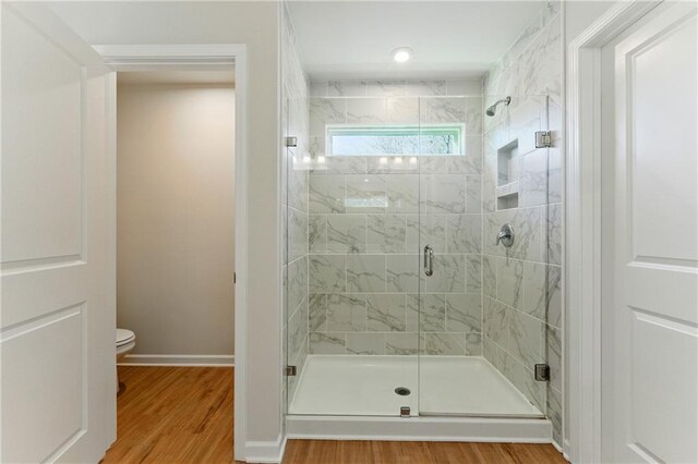 20 Running Ter NW, Cartersville, GA 30121 - full bathroom with toilet, a stall shower, baseboards, and wood finished floors