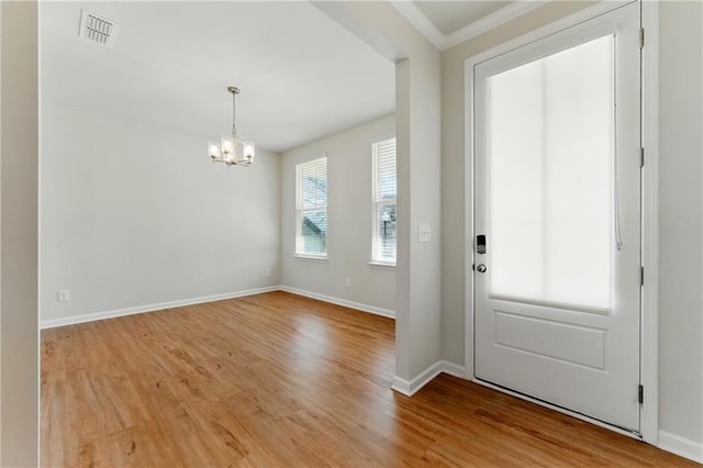 20 Running Ter NW, Cartersville, GA 30121 - entryway featuring light wood-style flooring, visible vents, a chandelier, baseboards, and ornamental molding