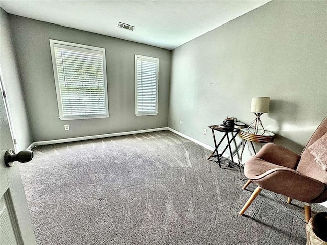 unfurnished room featuring carpet