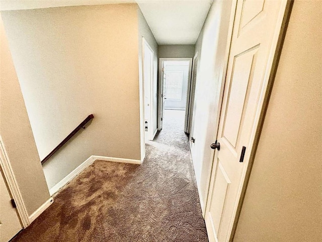 hallway with carpet