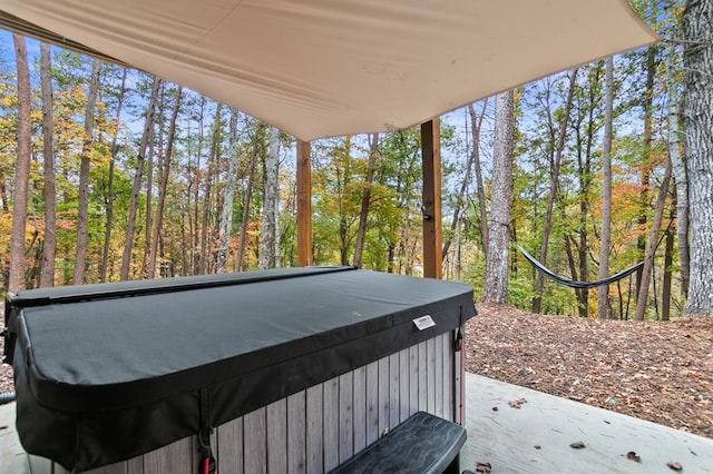 view of patio / terrace with a hot tub