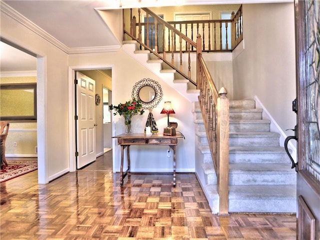 interior space with parquet flooring and ornamental molding