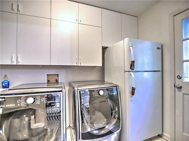 laundry area with washer and dryer