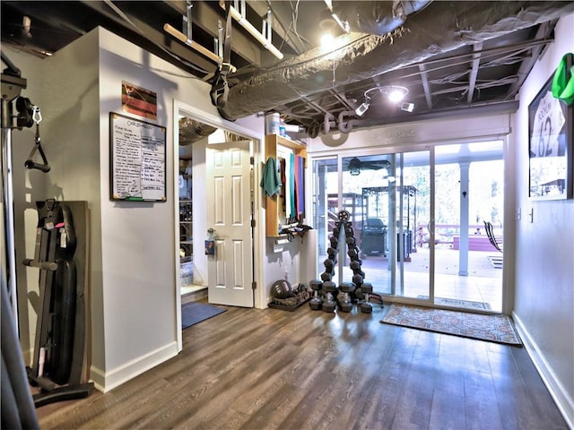 workout room featuring wood-type flooring