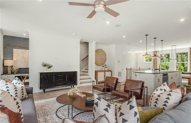 1088 Battery Park Rd, Decatur, GA 30033 - living room featuring a ceiling fan, recessed lighting, light wood-type flooring, and stairs