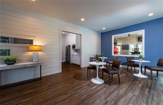 1088 Battery Park Rd, Decatur, GA 30033 - dining area with dark wood-type flooring, a ceiling fan, wood walls, recessed lighting, and baseboards